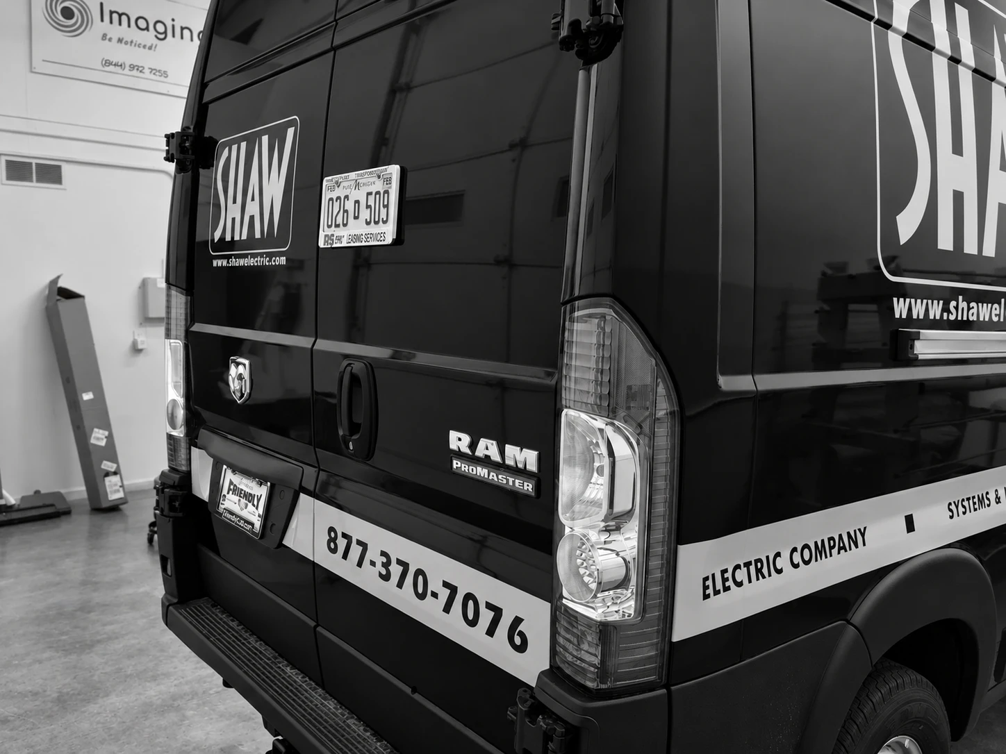 Rear detail of a finished commercial van graphics installation