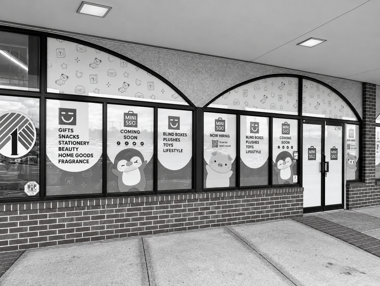 Character and promotional graphics across storefront windows