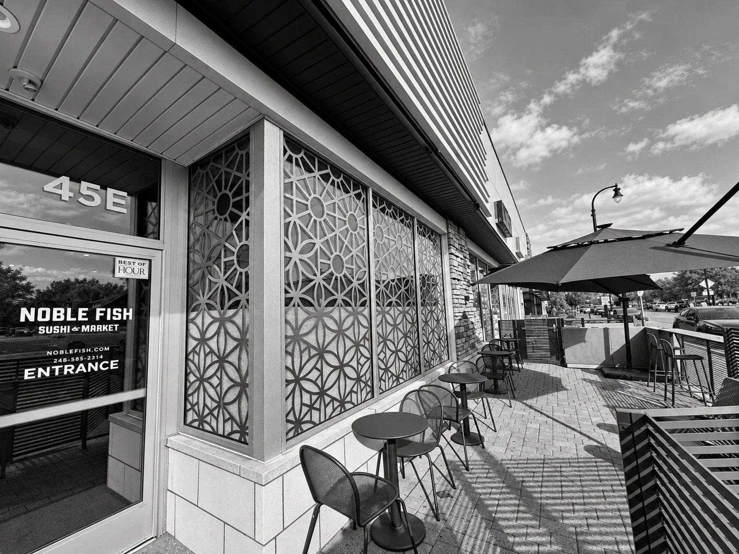 Oblique detail of geometric storefront window graphics