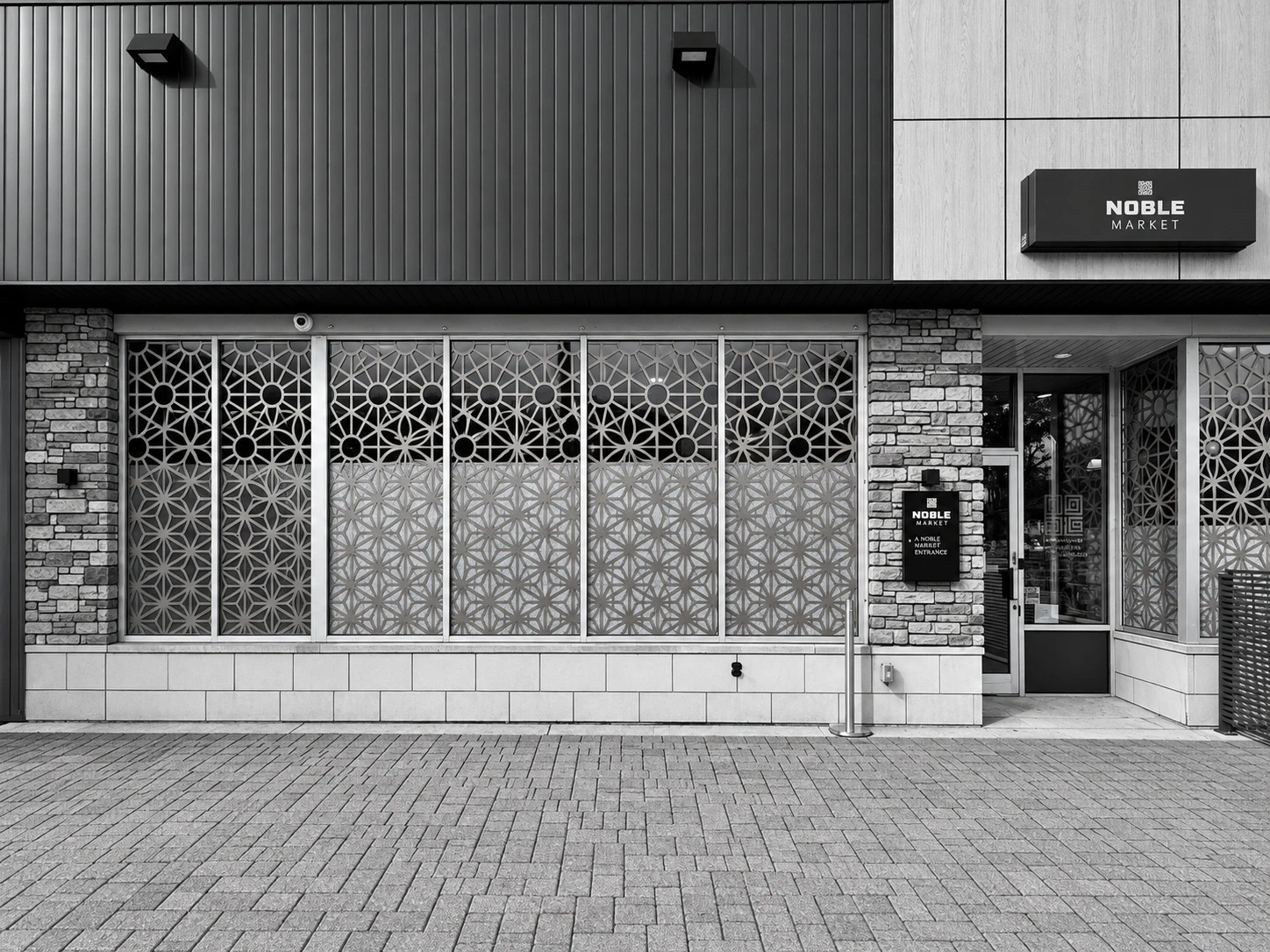 Geometric window graphics across a commercial storefront