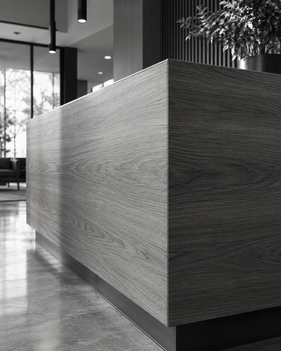 Illustrative finished wood-grain architectural film on a commercial interior panel